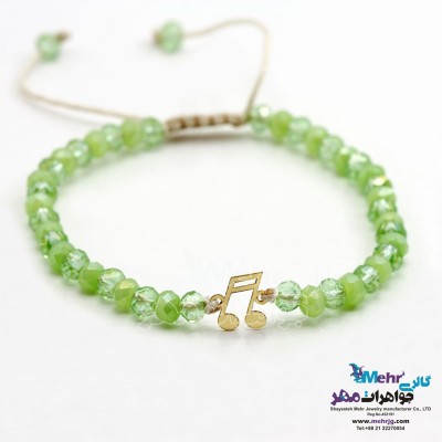 دستبند طلا و مهره - طرح نت موسیقی