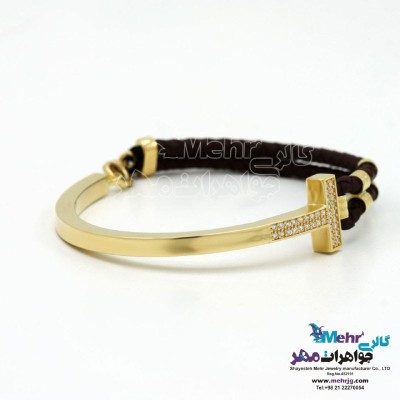 دستبند طلا و چرم - طرح تیفانی اند کو