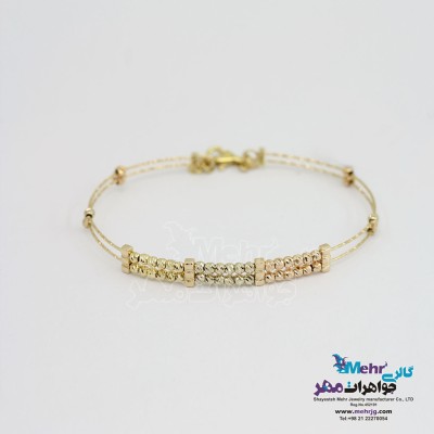 دستبند النگویی طلا - طرح گوی تراش