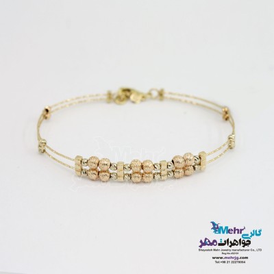دستبند النگویی طلا - طرح گوی تراش