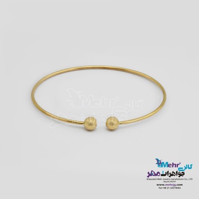 دستبند النگویی طلا - طرح گوی