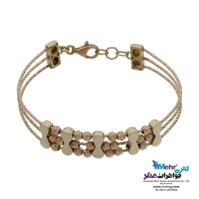 دستبند النگویی طلا - طرح گوی تراش