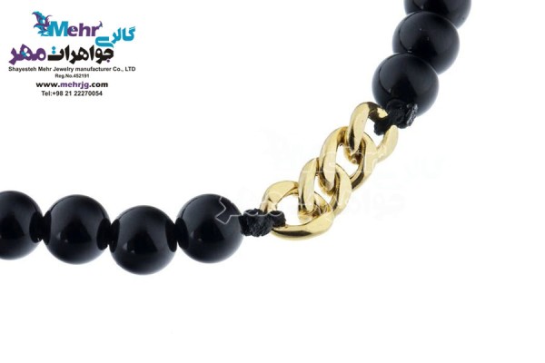 نمای دوم دستبند طلا و سنگ - طرح کارتیه