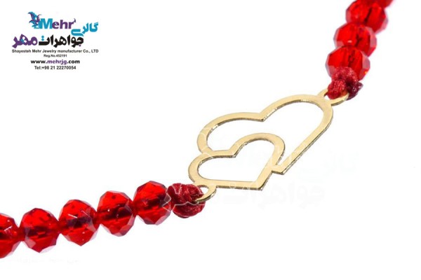 نمای دوم دستبند طلا و مهره - طرح قلب
