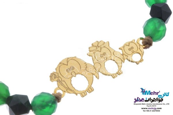 نمای دوم دستبند طلا و سنگ - طرح خانواده‌ی جغدها