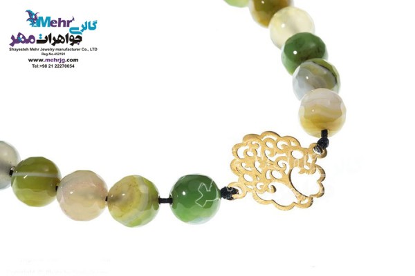 نمای دوم دستبند طلا و سنگ - طرح درخت زندگی