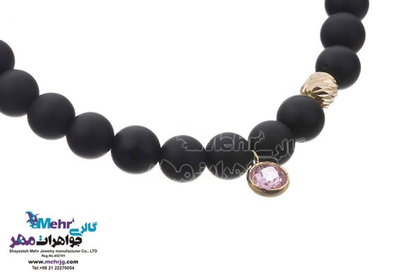 نمای دوم دستبند طلا و سنگ - طرح گوی تراش