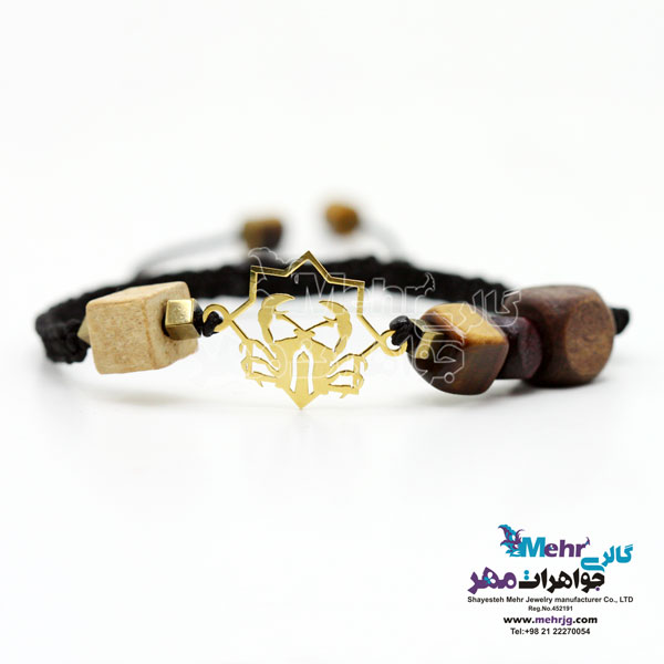 دستبند طلا و مهره - طرح ماه تولد تیر