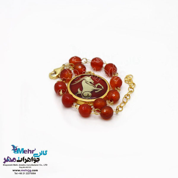 دستبند طلا و سنگ - ماه تولد دی