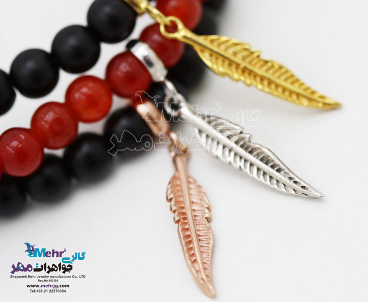 دستبند طلا و سنگ - طرح پر