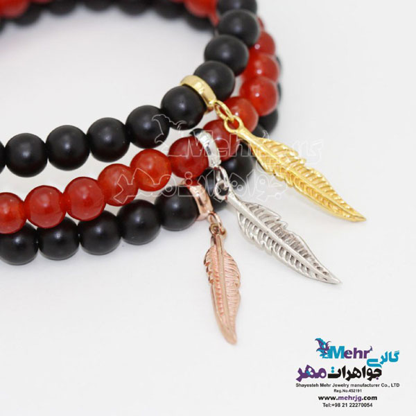 دستبند طلا و سنگ - طرح پر