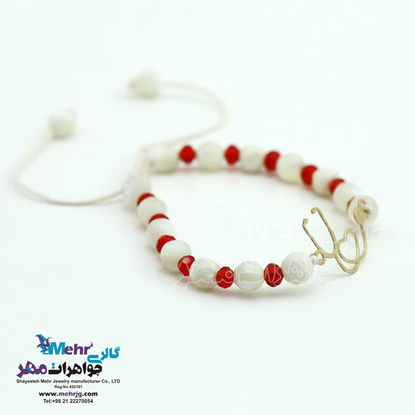دستبند طلا و سنگ - طرح گوشی پزشکی