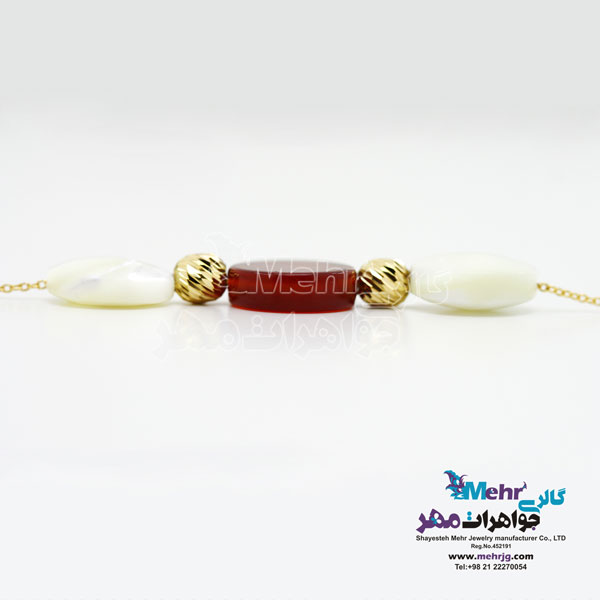دستبند طلا و سنگ - طرح گوی تراش