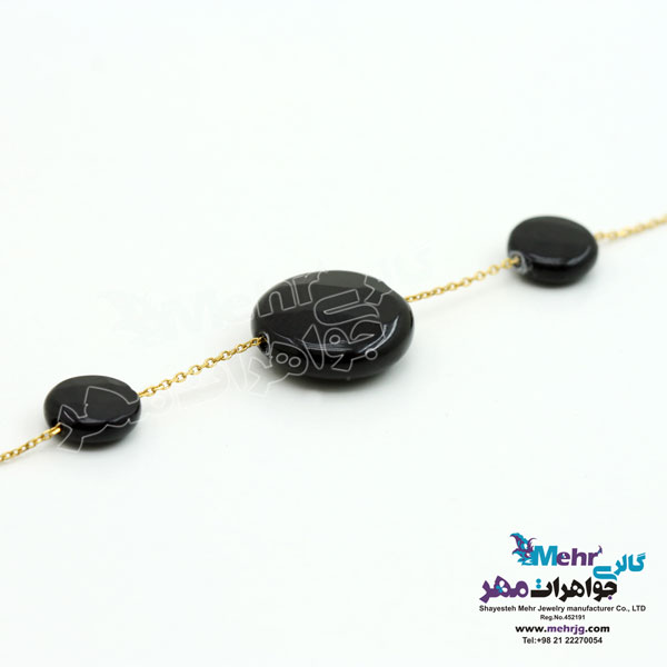 دستبند طلا و سنگ - طرح سنگ انیکس