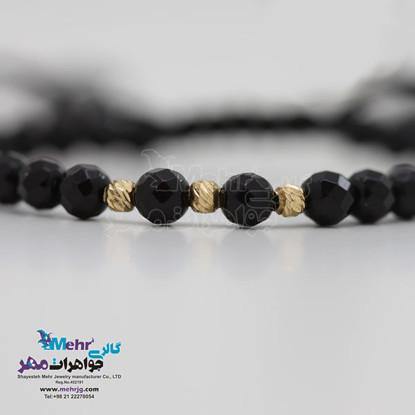 دستبند طلا و سنگ - طرح گوی تراش