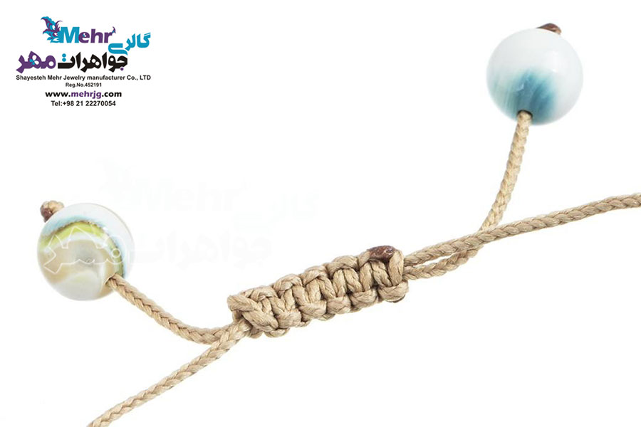 دستبند طلا و سنگ - طرح کلبه‌ی عشق