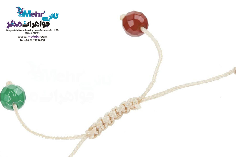 دستبند طلا و سنگ - طرح پرنده و قفس