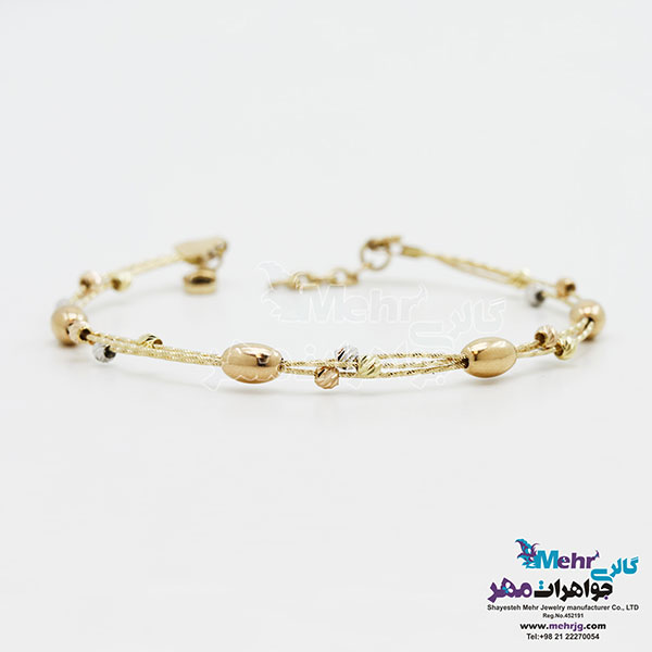 دستبند النگویی طلا - طرح گوی تراش
