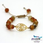 دستبند طلا و سنگ - طرح طاووس