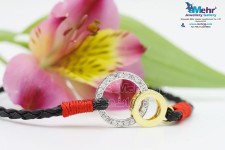 دستبند طلا و چرم - طرح برمس
