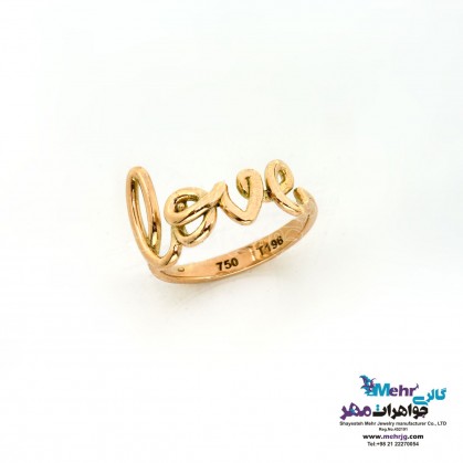 gold ring that says love